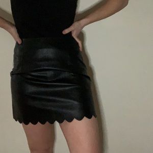 Black faux leather scalloped skirt